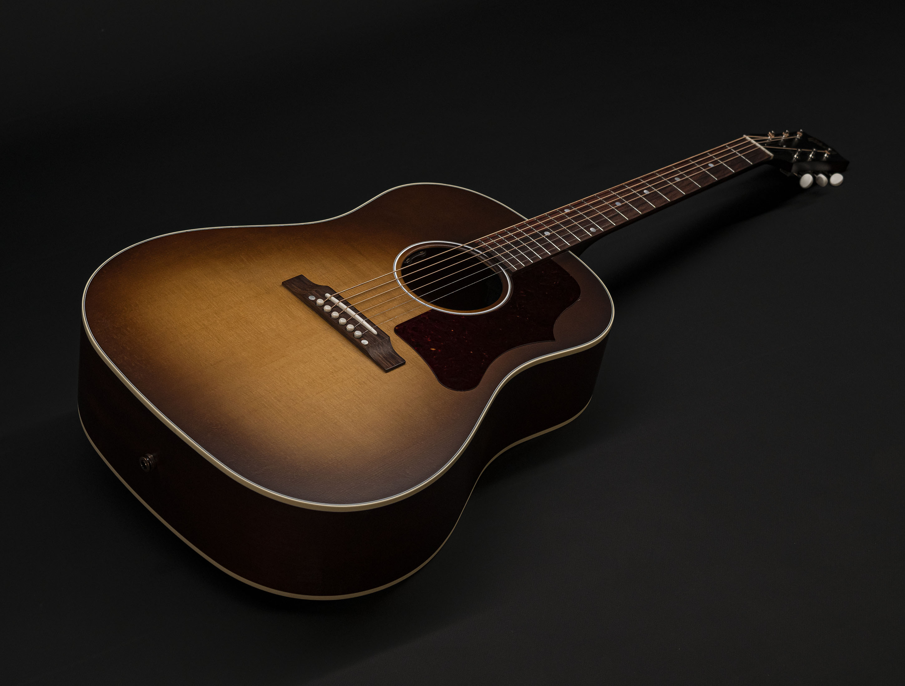Show gallery (25 images) a121259 gibson-j-45-50s-faded-vintage-sunburst