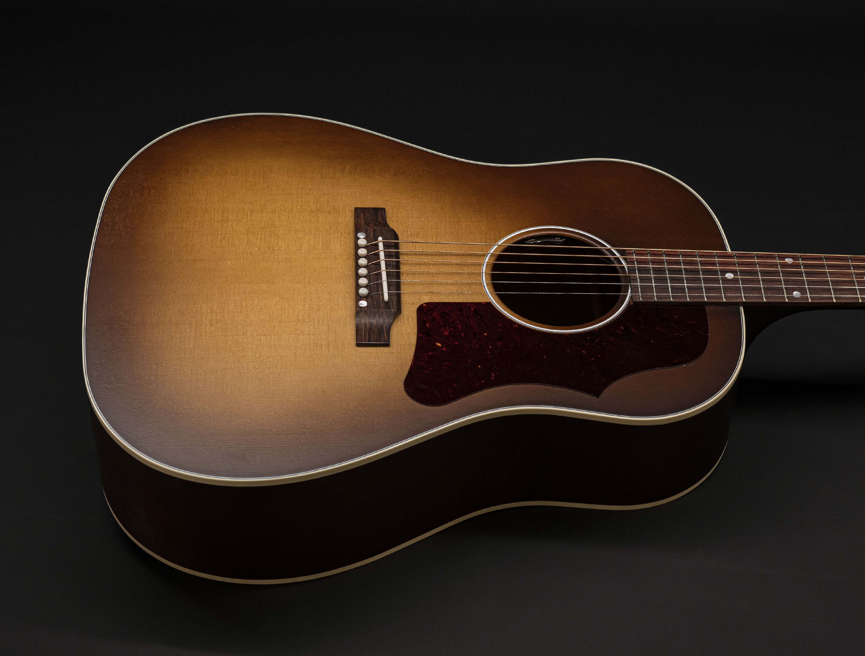 Show gallery (25 images) a121260 gibson-j-45-50s-faded-vintage-sunburst