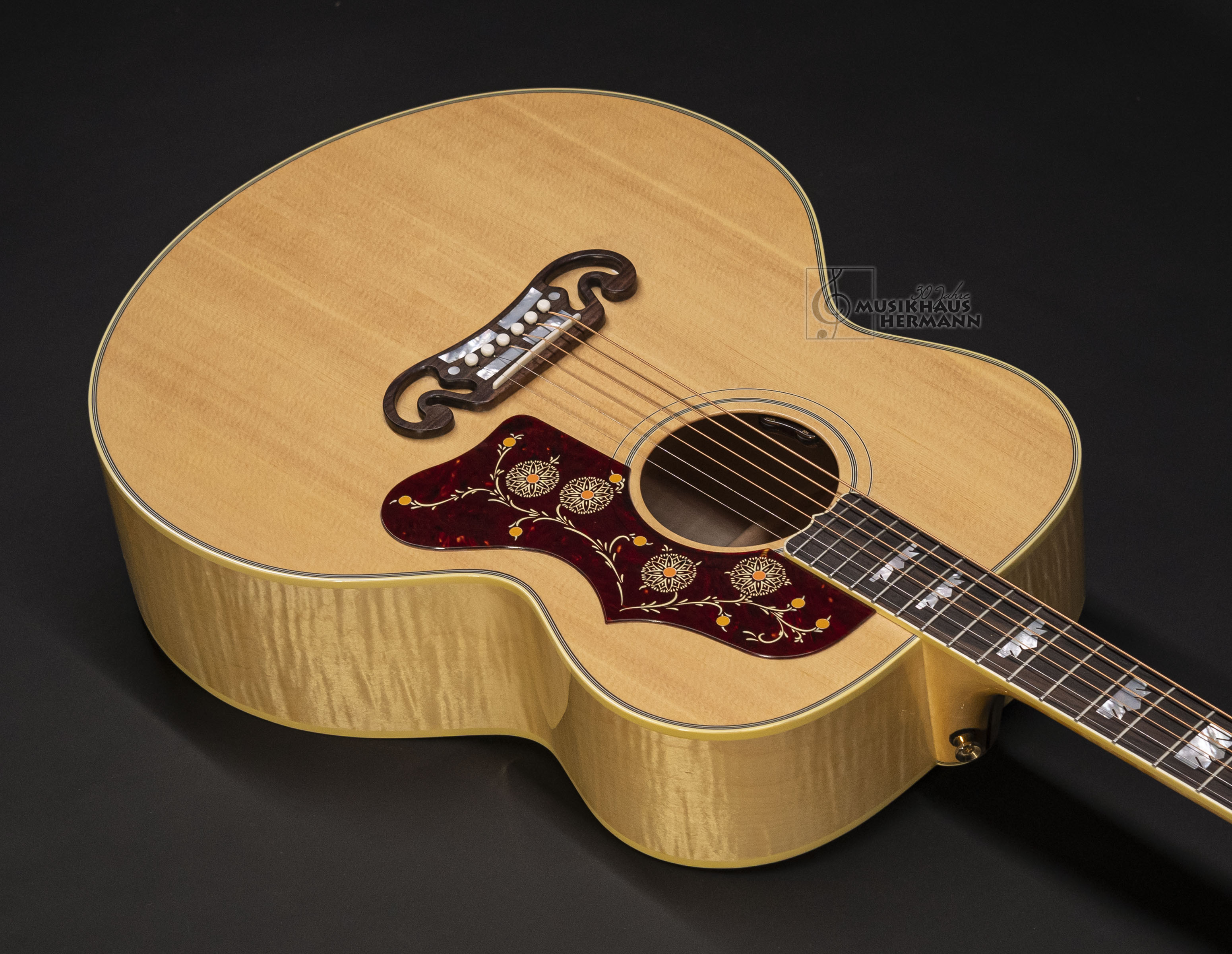 Show gallery (15 images) a8-6860-gibson-sj-200-original-an-antique-natural