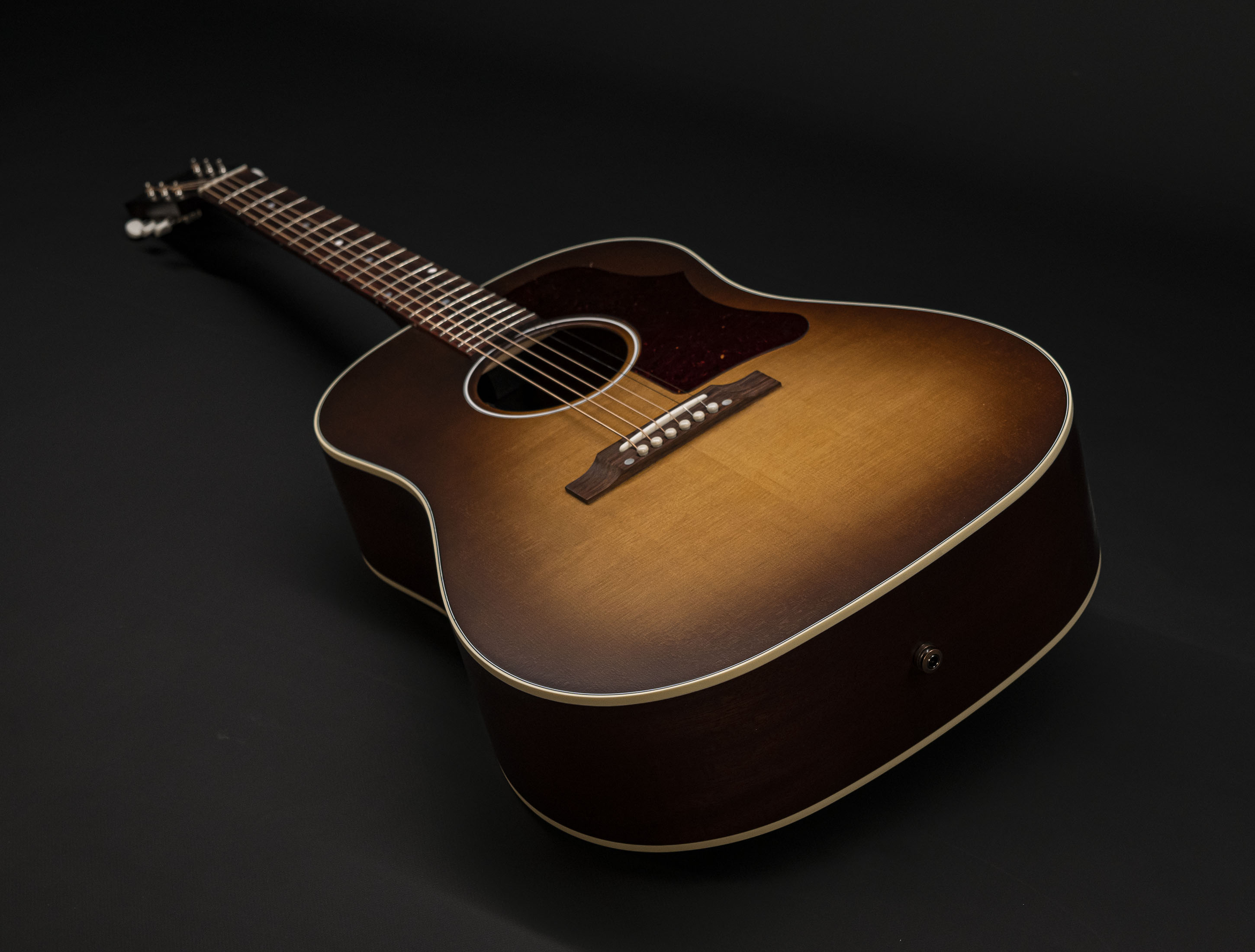 Show gallery (25 images) a121274 gibson-j-45-50s-faded-vintage-sunburst