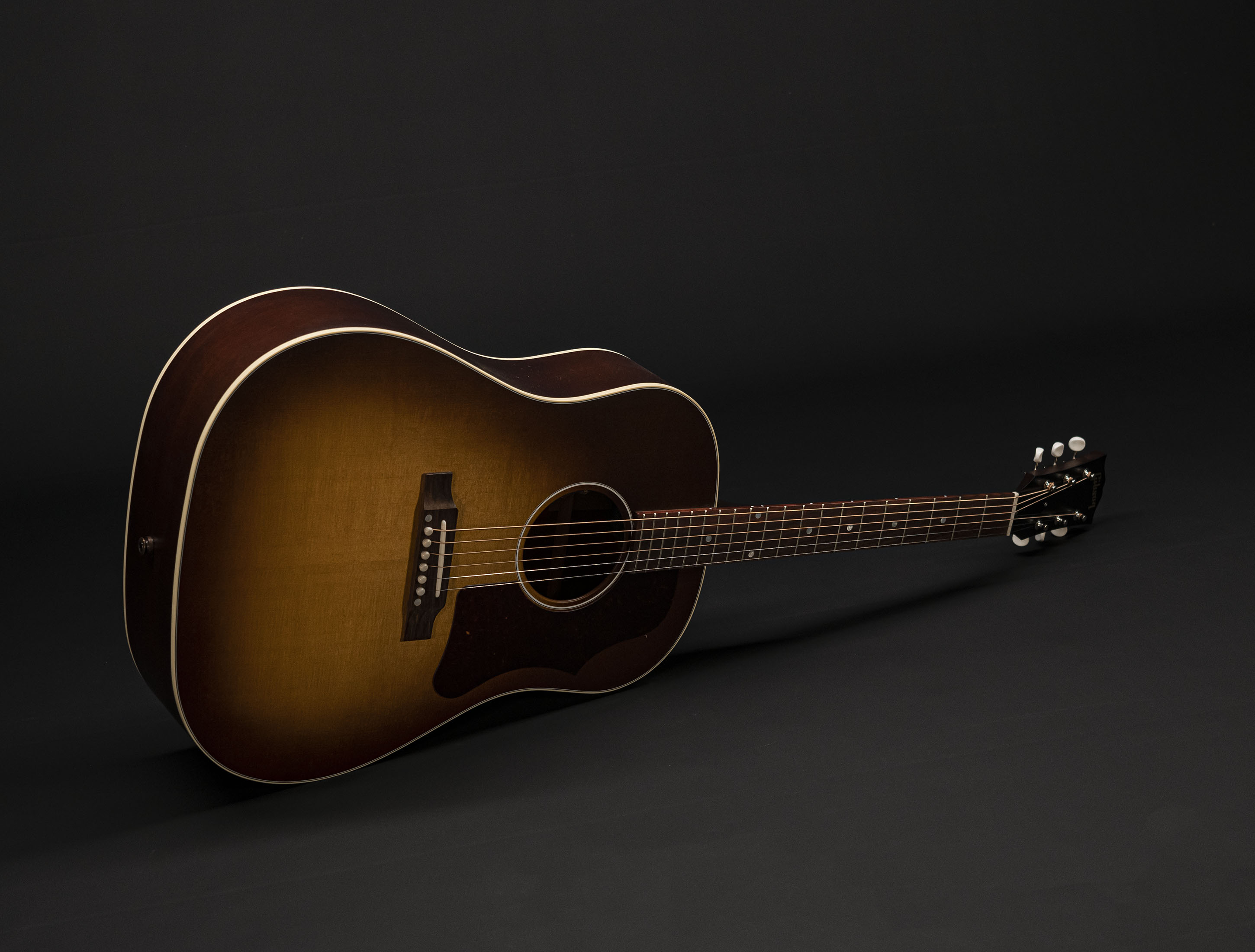 Show gallery (25 images) a121276 gibson-j-45-50s-faded-vintage-sunburst